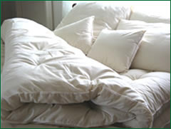 Organic wool comforters with breathable warmth while staying cool in the summer Snuggle Ewe Comforter