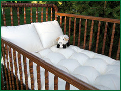 Organic wool baby mattresses completely chemical free keeping your baby safe Baby crib with little stuffed sheep in corner