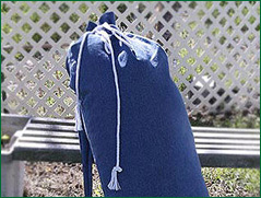 Sleep on the comfort of wool when traveling with the Surround Ewe mattress topper made for travel Duffle bag for easy transport of traveler mattress topper