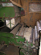 Wool mattress fill ready for carding Wool mattress fill entering the carding machine