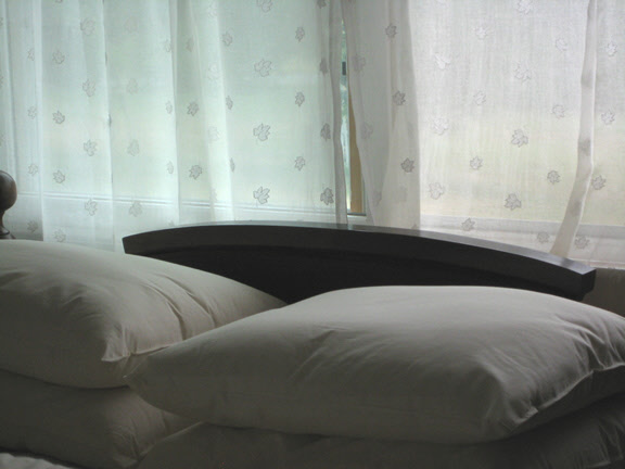 Organic cotton/ ECO-Pure wool Pillows on bed