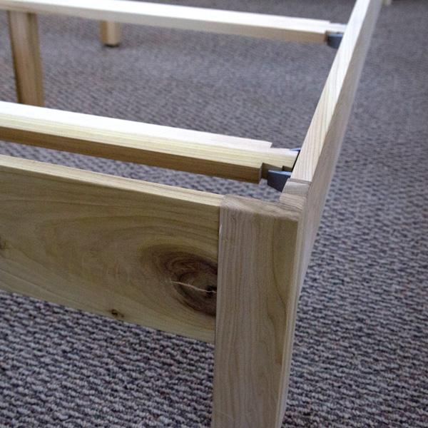 Natural poplar wood bedframe is easy to put together in the bedroom or dorm room