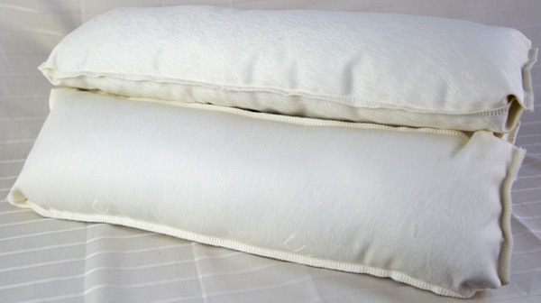 Organic cotton covered wool fill neck roll