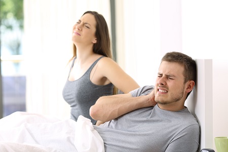 Couple Sleeping on Toxic Mattress