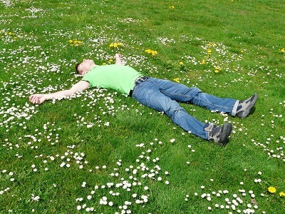Man Sleeping on Field